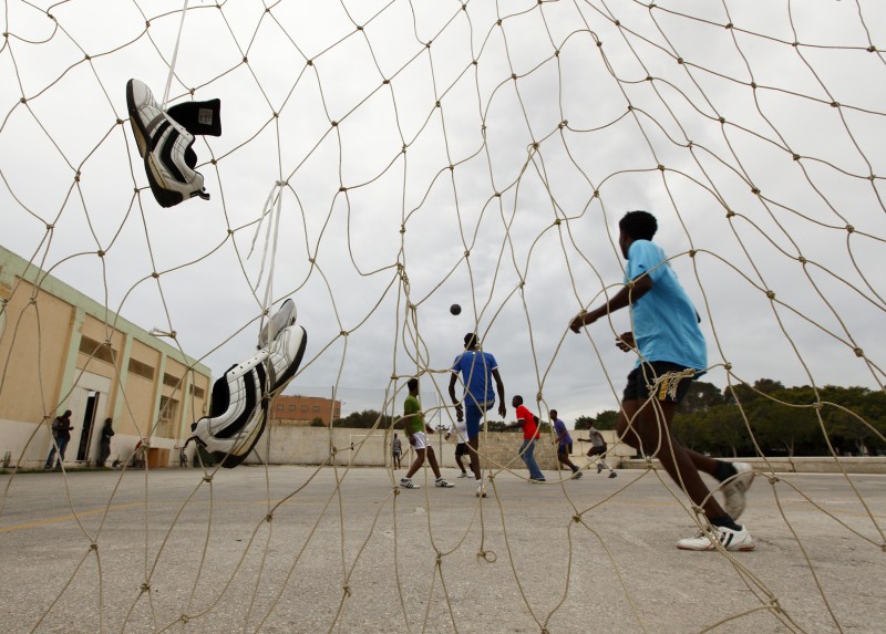 African immigrants play football at the Marsa Open Centre in Marsa in Valletta's Grand Harbour May 29, 2010. 